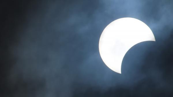 partial-solar-eclipse-cloudy-day